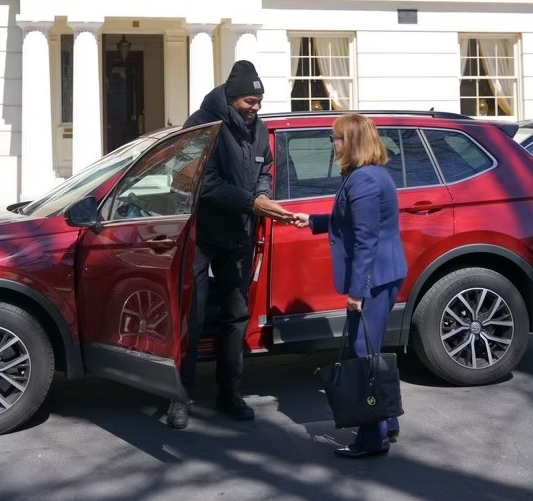 Valet handing keys back to a guest